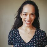 a woman with a smile on her face